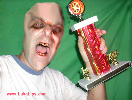 Troy Lukkarila celebrates with his trophy